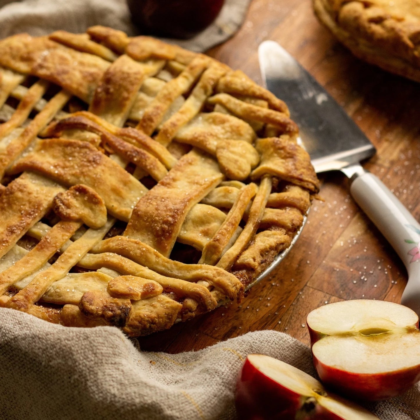 A large freshly baked apple and cinnamon pie fresh from the oven.