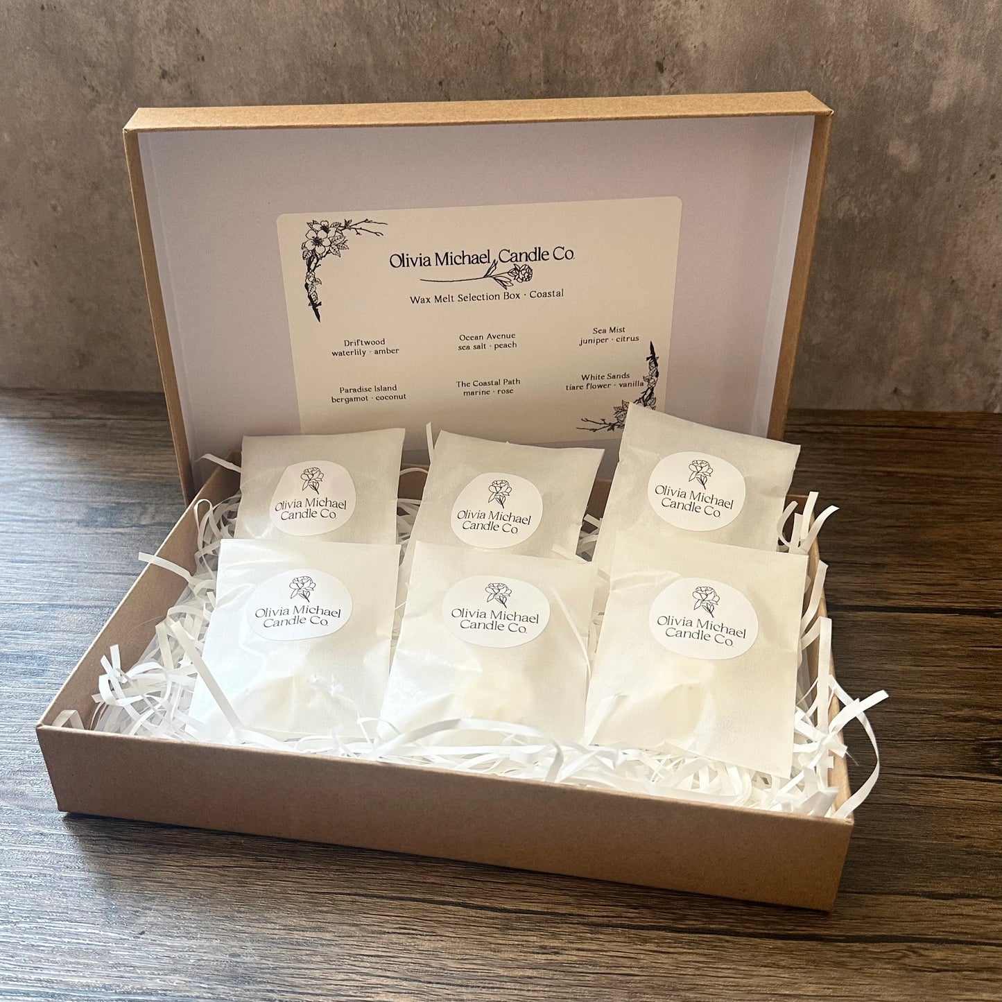 Our wax melt discovery box open with a pack of six coastal scents inside