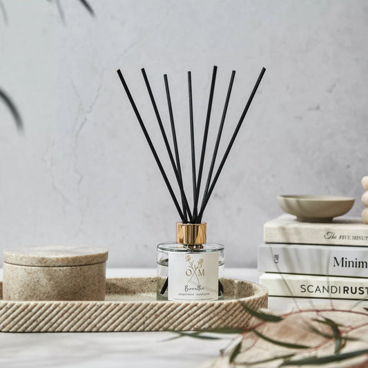 Our peppermint and eucalyptus diffuser is on display in a clear glass jar.